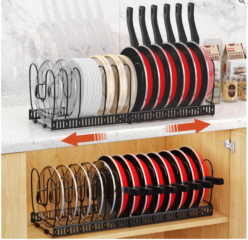 Black expandable Housolution cookware organizer holding pans, plates, lids, and cookware.
